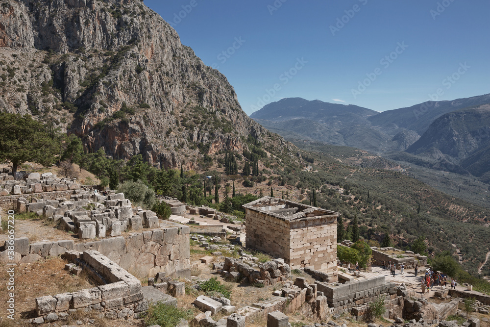 Fototapeta premium Archaelogical site of Delphi, Greece. Delphi is ancient sanctuary that grew rich as seat of oracle that was consulted on important decisions throughout ancient classical world. UNESCO World heritage