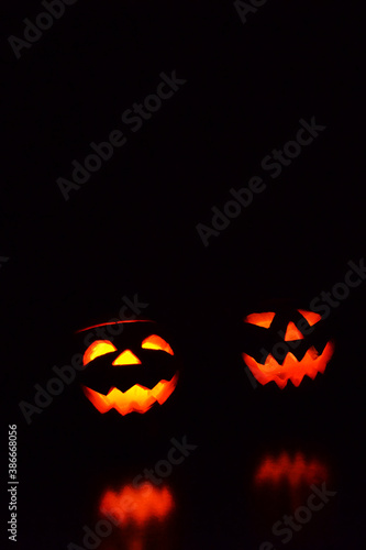 two halloween pumpkins jack o lantern glow in the dark