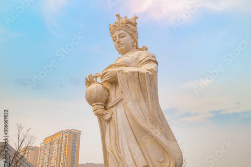Mazu - a Chinese sea goddess, the statue situated on the side of Tianhou Temple at Guwenhua Jie street in Tianjin, China photo