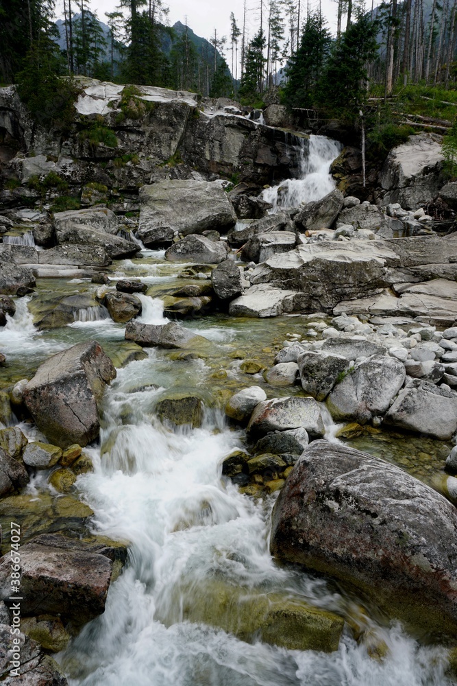 Mountain river and waterfall in High Tatras National Park, Slovakia Mountain river and waterfall in High Tatras National Park, Slovakia