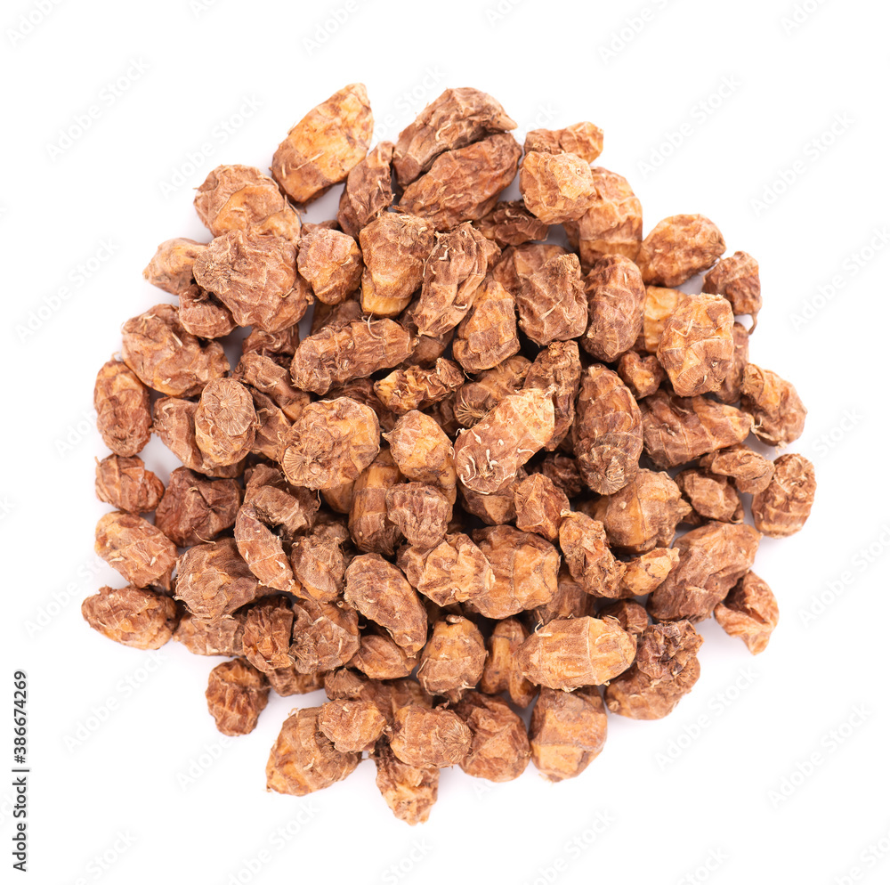Tigernuts isolated on white background. Pile of chufa nuts or tiger nuts. Top view. Tigernuts isolated on white background. Pile of chufa nuts or tiger nuts. Top view.