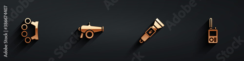 Set Brass knuckles, Cannon, Flashlight and Walkie talkie icon with long shadow. Vector.