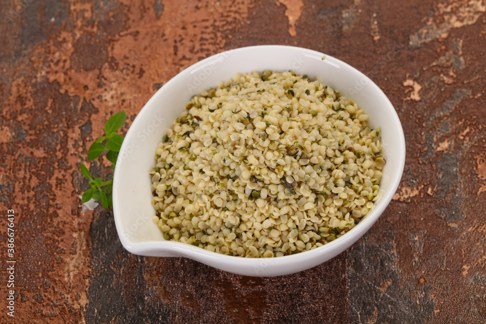 Peeled hemp seeds in the bowl Peeled hemp seeds in the bowl