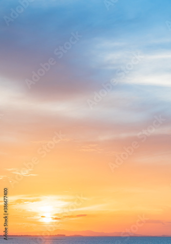 sunset sky vertical over the sea in the evening  © Nature Peaceful 