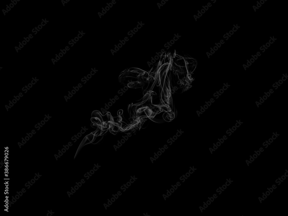 Abstract white puffs of smoke swirls overlay on black background pollution. Royalty high-quality free stock photo image of abstract smoke overlays on black background. White smoke swirl fragments