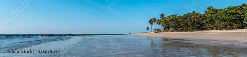 Panorama of an empty tropical beach north of Chaung Thar, Irrawaddy, Myanmar