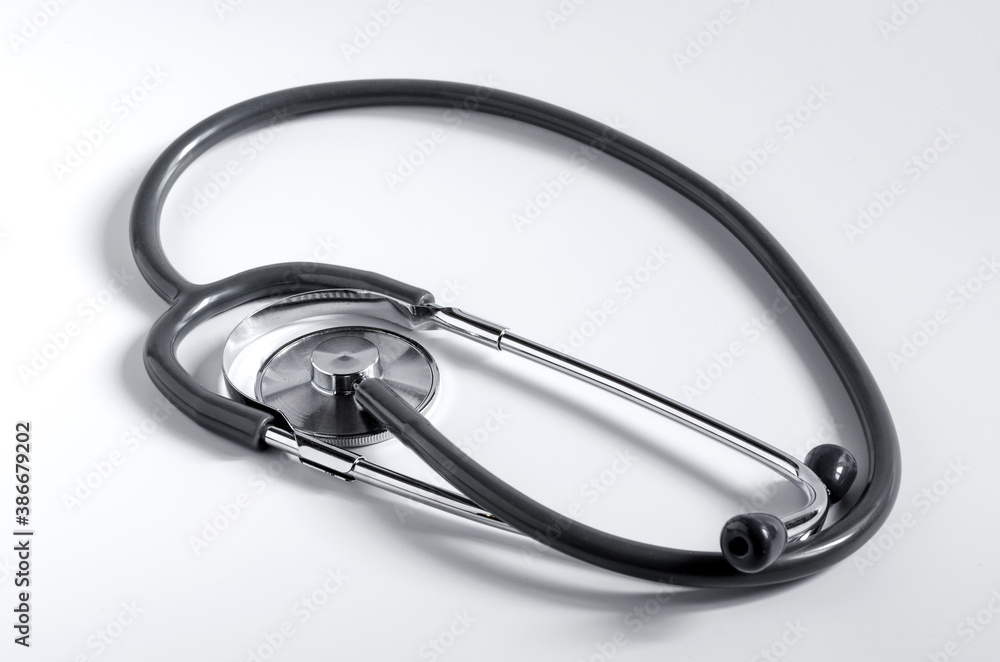 medical stethoscope close - up on a white background listening device medical stethoscope close - up on a white background listening device