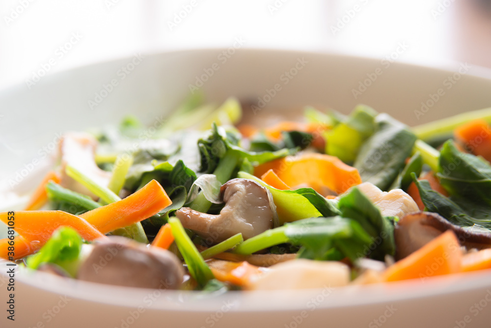selective focus of stir fried mixed vegetable and mushroom selective focus of stir fried mixed vegetable and mushroom