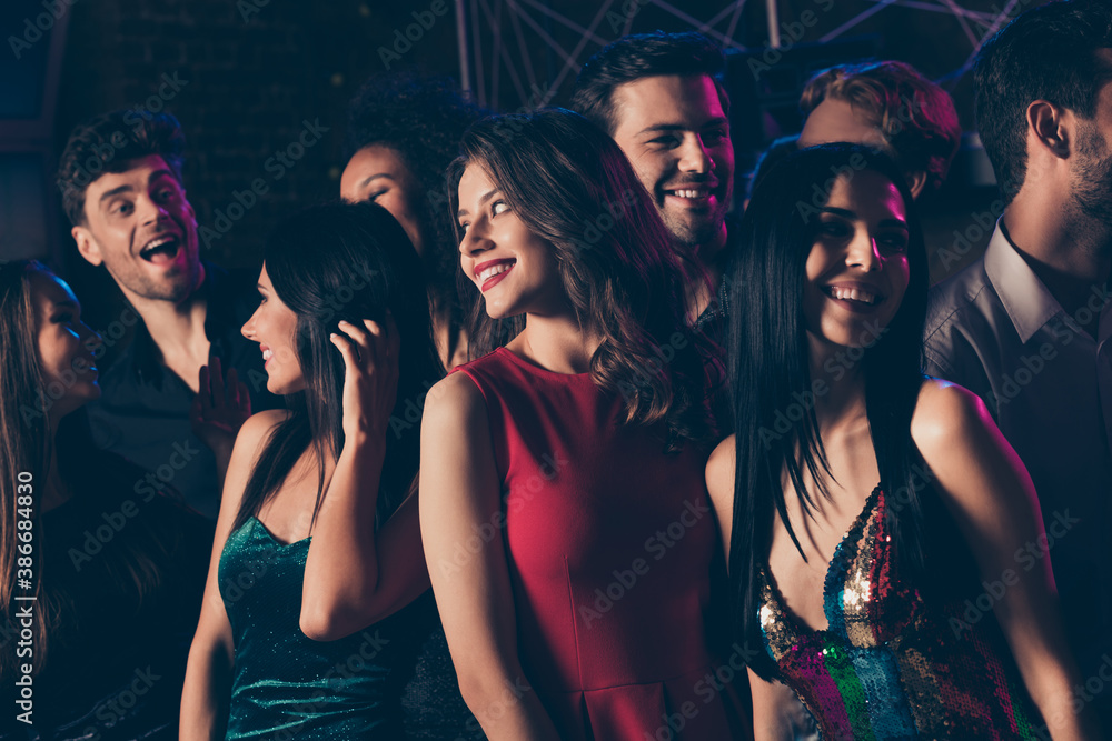 Photo of girl wearing red dress lipstick smiling chilling together dancing with friends in night club on corporate new year party