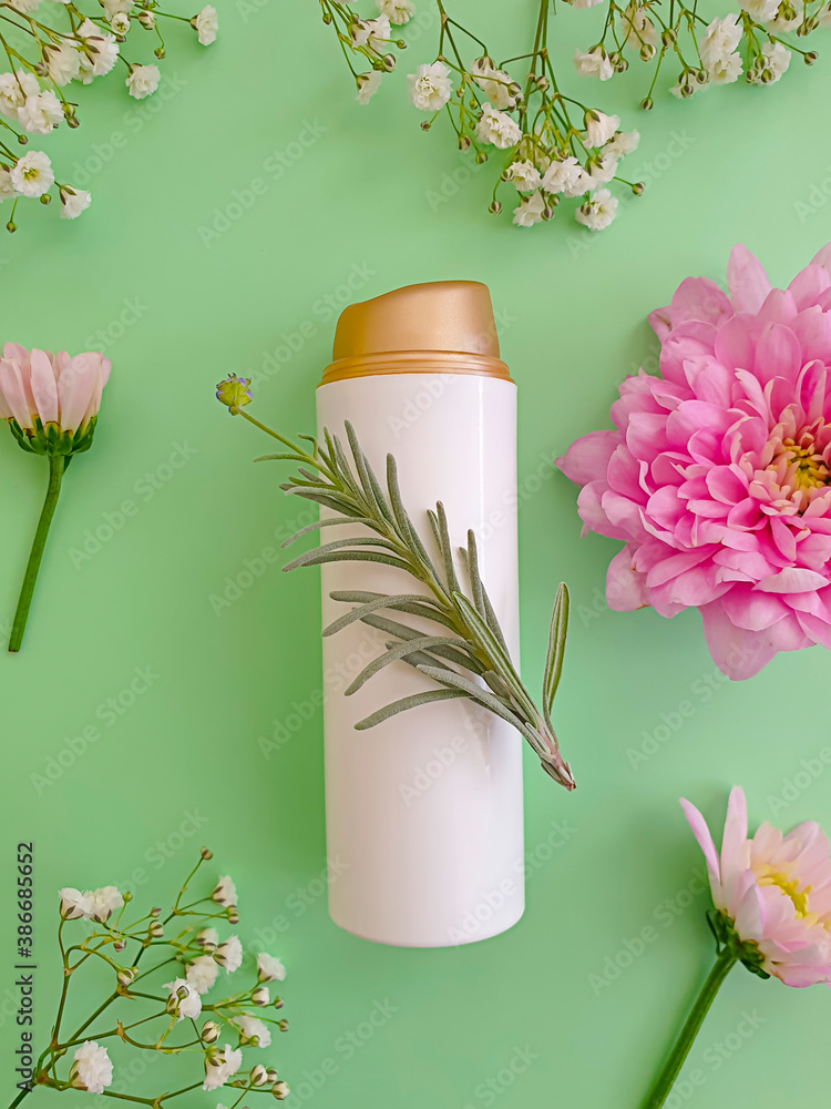 cosmetic cream, flower on a colored background cosmetic cream, flower on a colored background