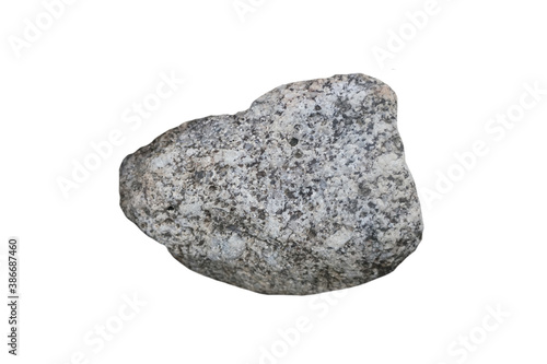 plutonic granite  rock isolated on white background. Its three main minerals are feldspar, quartz, and mica, which occur as silvery muscovite or dark biotite or both.  photo