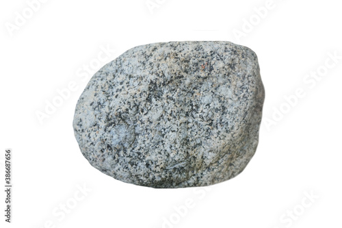 a piece of granite rock isolated on a white background. © Montree