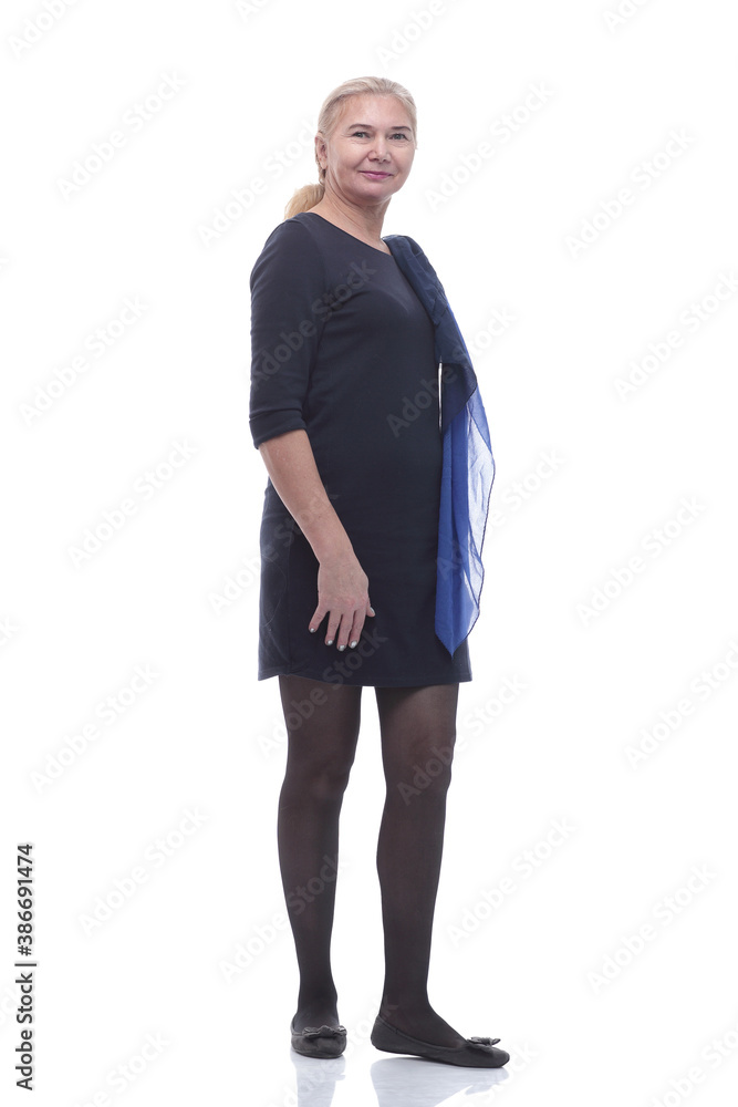 in full growth. casual mature woman in black dress in full growth. casual mature woman in black dress
