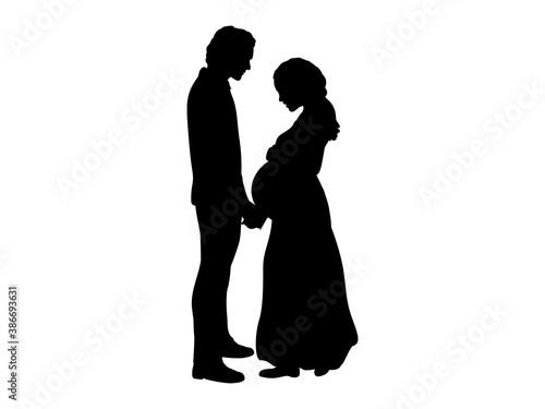 Silhouette couple expecting baby hold hands