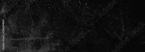 Cement texture rich black background, brush stroke on marble stone or stone texture banner with elegant black and dark gray color and design.
