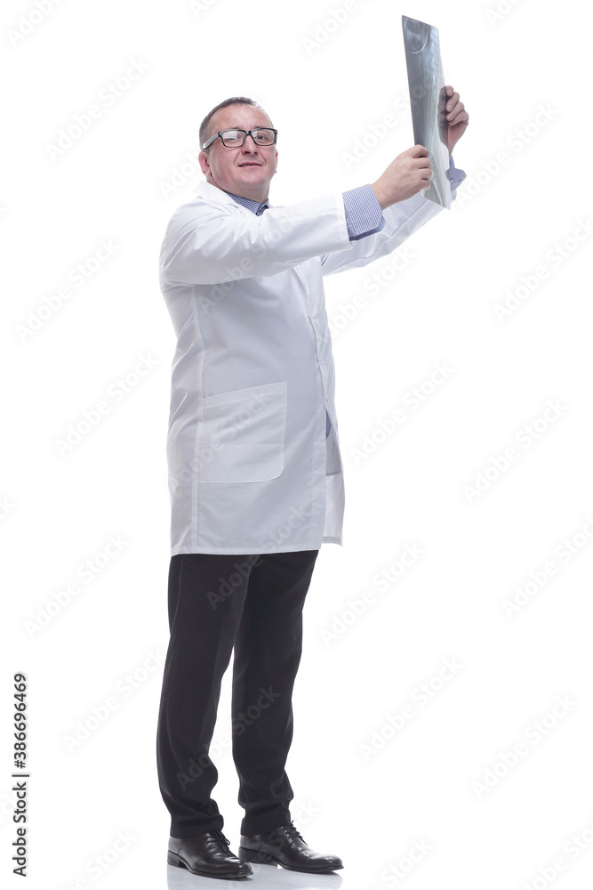 side view. male doctor with an x- ray of a patient side view. male doctor with an x- ray of a patient