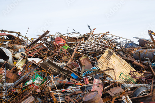 pile of large amounts of metal and waste in the junkyard for recykling