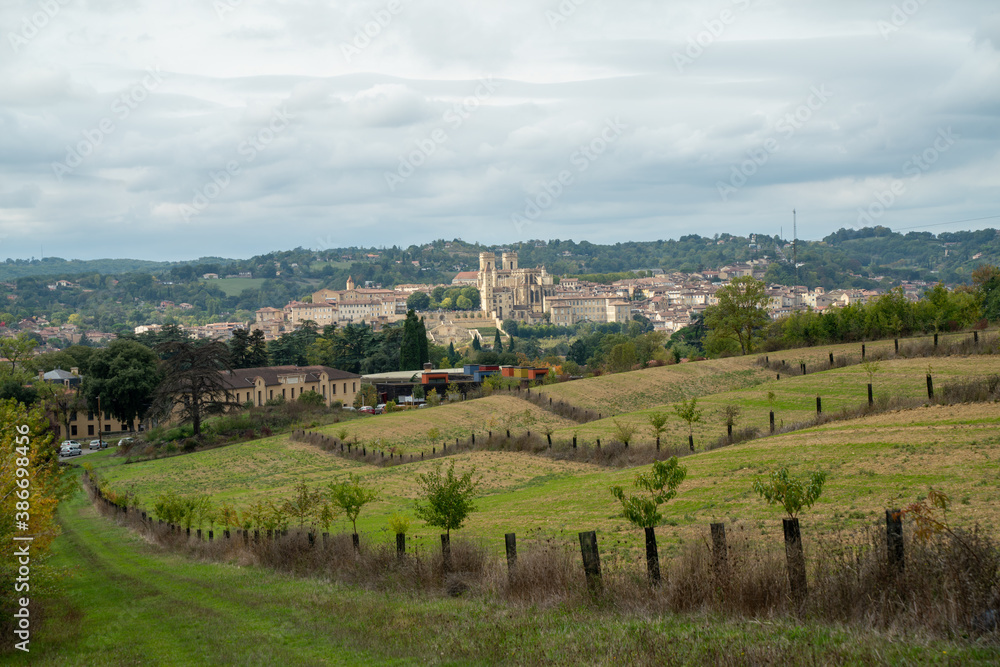
Landscape of the city of Auch, in France, in the distance its cathedral, in front, the countryside, under an overcast sky