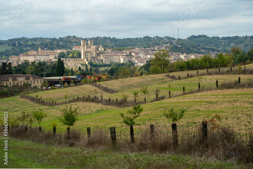  Landscape of the city of Auch, in France, in the distance its cathedral, in front, the countryside, under an overcast sky