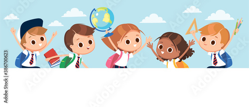 School days. Excited pupils on outdoor break. Children having fun, childhood, friends. Group of pupils holding pencils, ruller, globe.