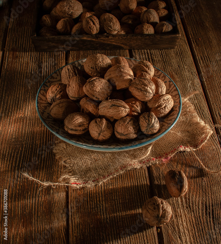 Nuts on a wooden table. With natural light