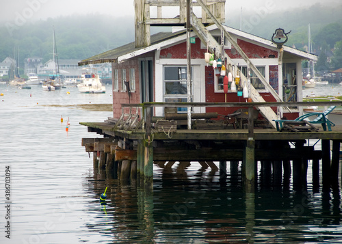 Fototapeta Fishing village docks on the water in Boothbay Harbor Maine