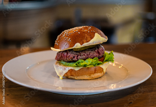 hamburger in a plate in a french bistrot