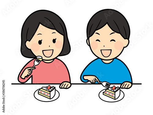 boy and girl eating cake