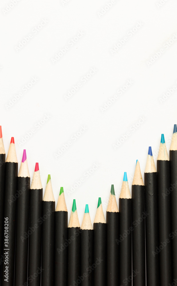 Black pencils with colored tips, white background Black pencils with colored tips, white background