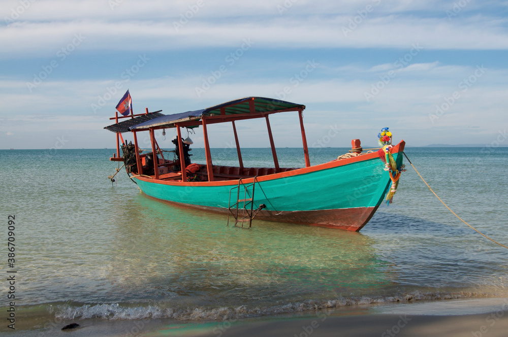 Fototapeta premium Typical cambodian long tale boat