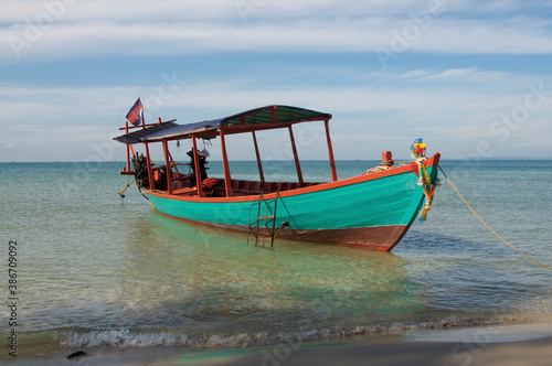 Typical cambodian long tale boat