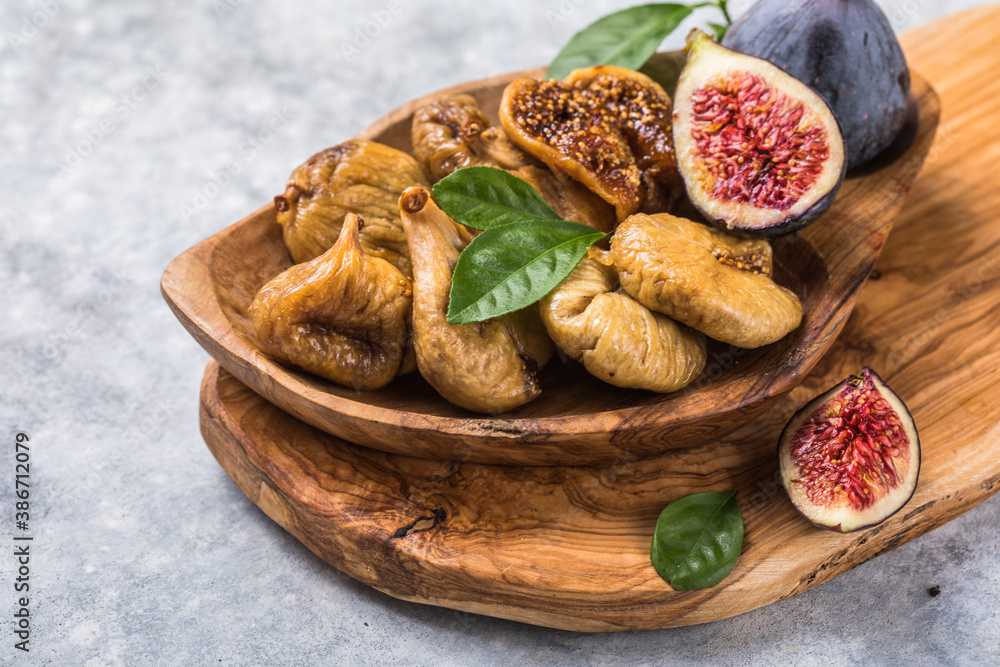 Fototapeta premium Organic dried figs close up, vegetarian food background