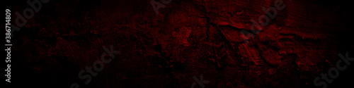 Dark background grunge texture design with distressed dark red rust pattern, paint splashes, broken cracks and blemishes