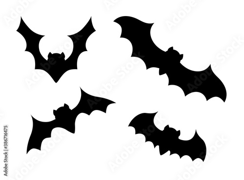 Halloween black bat icon set. Flying fox night creatures illustration. Silhouettes of flying bats traditional Halloween symbols on white. Vector background.