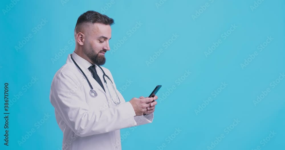 Doctor using mobile phone, texting to patient, informing about medical test results, blue background with empty space