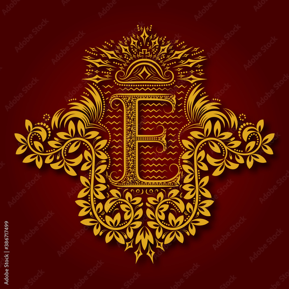 Letter E heraldic monogram in coats of arms form. Vintage golden logo with shadow on maroon background. Letter E is surrounded by floral elements of design. Letter E heraldic monogram in coats of arms form. Vintage golden logo with shadow on maroon background. Letter E is surrounded by floral elements of design.
