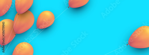 Yellow balloons with threads on blue background.