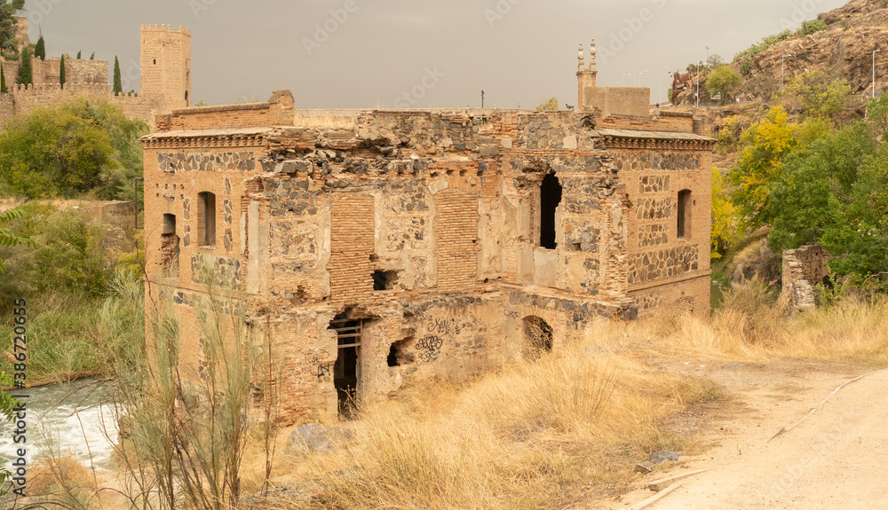 OLD MILL NEXT TO THE RIVER IN TOLEDO, MEDIEVAL CITY