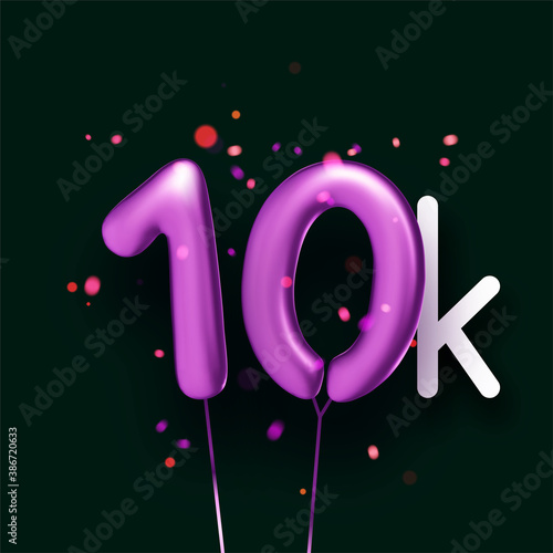 10k sign violet balloons with threads on black background.
