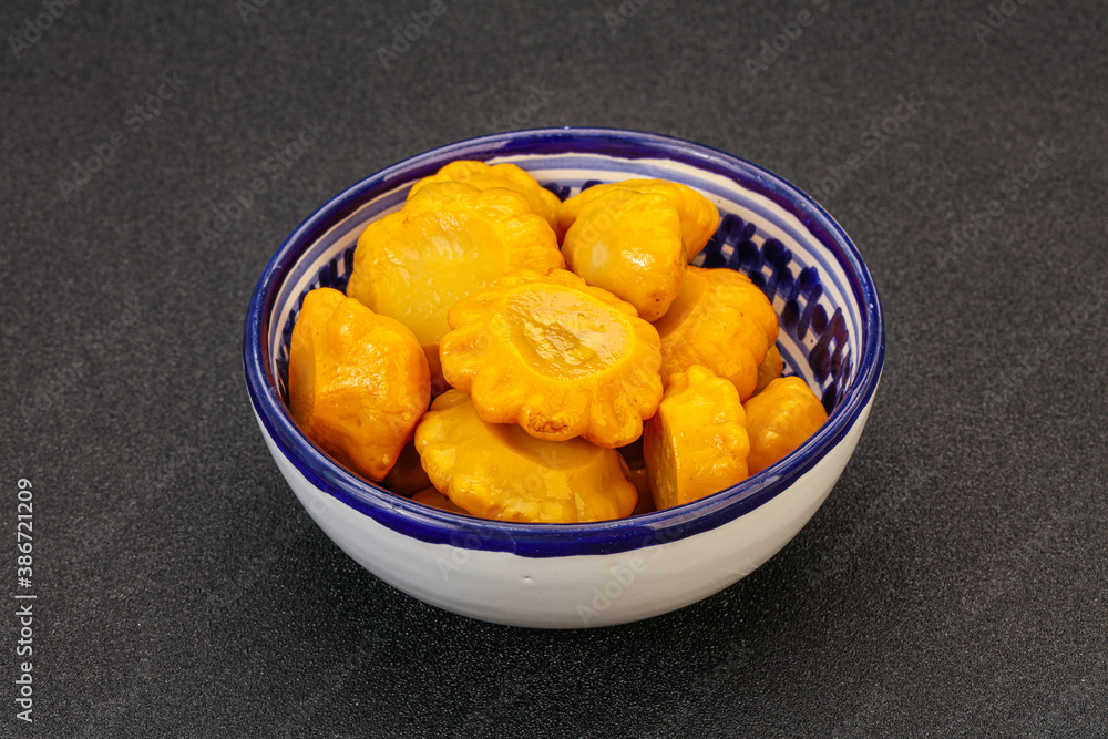 Marinated yellow patisson in the bowl Marinated yellow patisson in the bowl