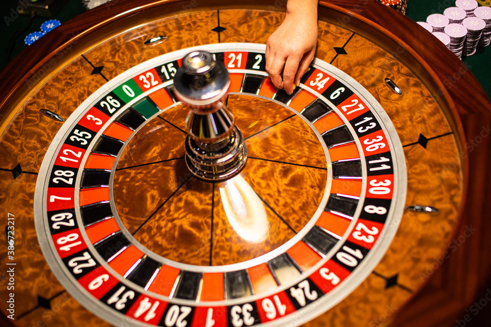 Close-up of luxury casino wooden roulette wheel. Close-up of luxury casino wooden roulette wheel.