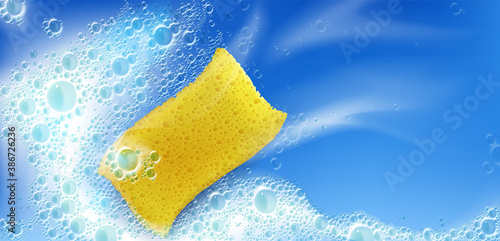 Cleaning foam with yellow sponge and bubbles on blue background with white stains, froth, foamy texture, liquid soap or shampoo lather. Laundry detergent spume realistic 3d vector illustration, banner