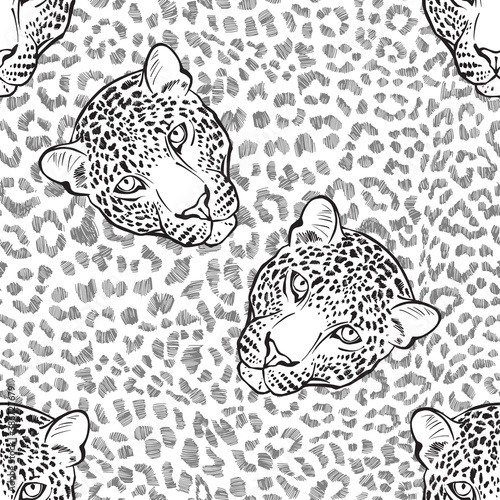 Leopard fur texture and leopard faces. Seamless pattern. Hand-drawn vector illustration. Animal art background.