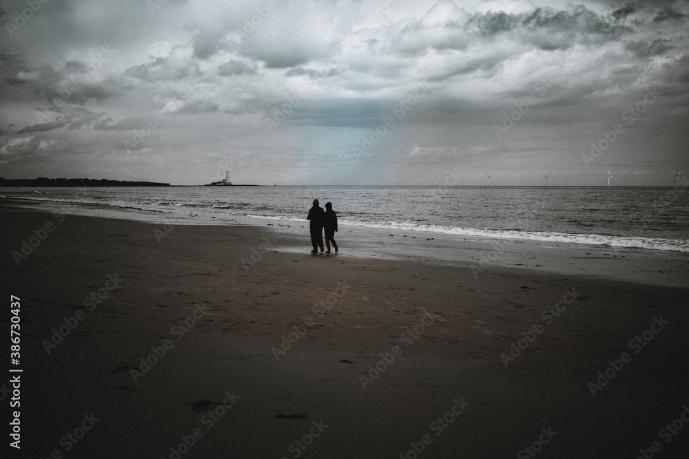 Naklejka premium walk on the beach