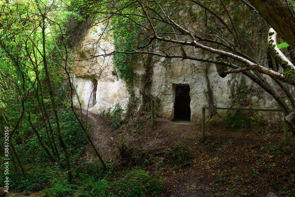 photos of the Portuguese caves, Burgos, Spain, Ancient houses dug into the rock of the mountain where in the Middle Ages the hermits lived praying retired from the world. September 2020 photos of the Portuguese caves, Burgos, Spain, Ancient houses dug into the rock of the mountain where in the Middle Ages the hermits lived praying retired from the world. September 2020