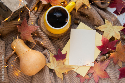 fall mockup card with autumn leaves invitation card with environment and details Mockup with postcard and flowers and ribbon on white background.