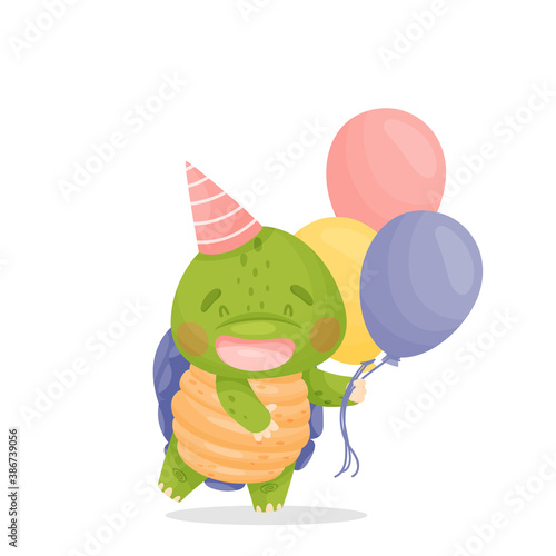 A cute cartoon green turtle smiling. There is a red festive hat on his head, holding multi-colored balloons in his hands. Isolated vector illustrations on white background.