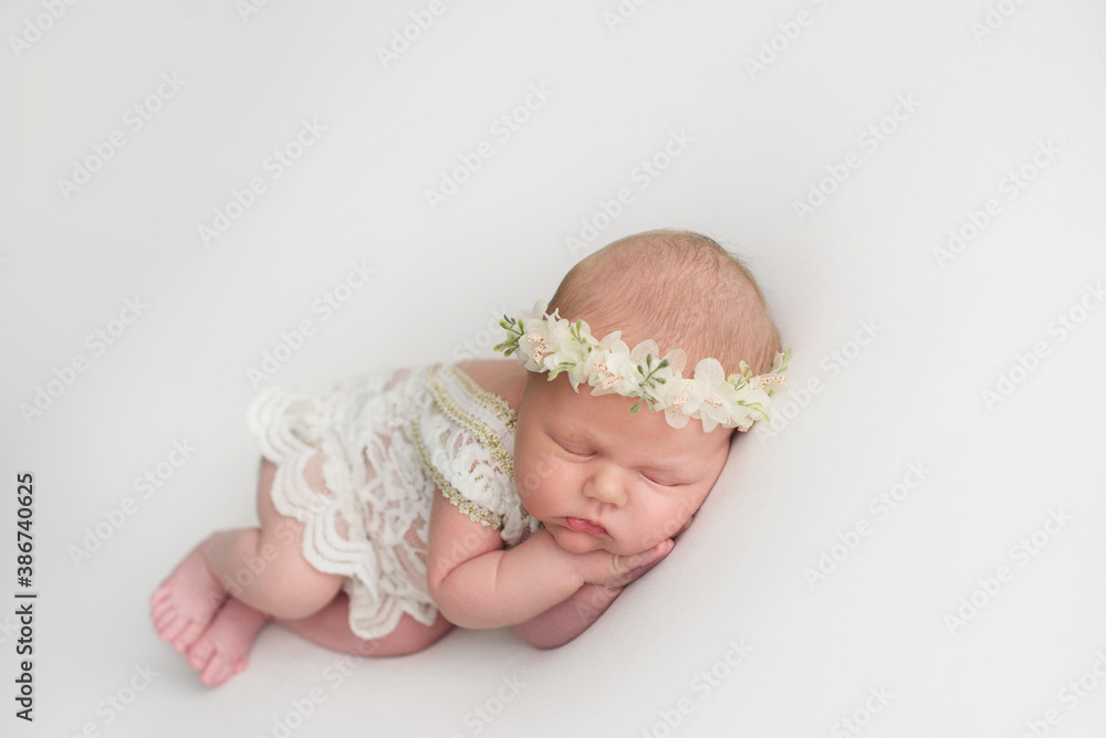 Adorable baby sleeping on his hands. first days of life. Great sleep of newborn Adorable baby sleeping on his hands. first days of life. Great sleep of newborn