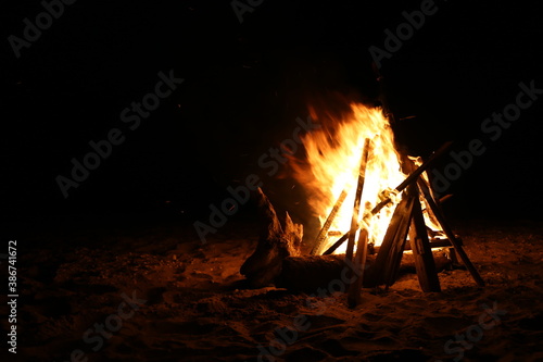 bonfire on the beach at night