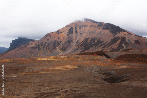 Hills, mountains and autumnal tundra, colored orange and red © Anna_Barynina